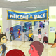 Some dinosaur characters walk around in high school.
